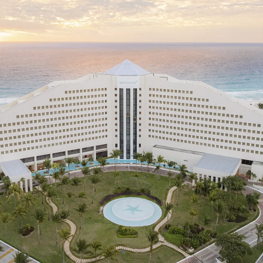 Aerial view of an Iberostar resort in Cancún at sunrise