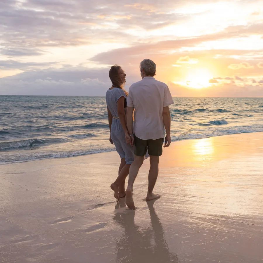 Sunset walk on the beach at an Iberostar resort