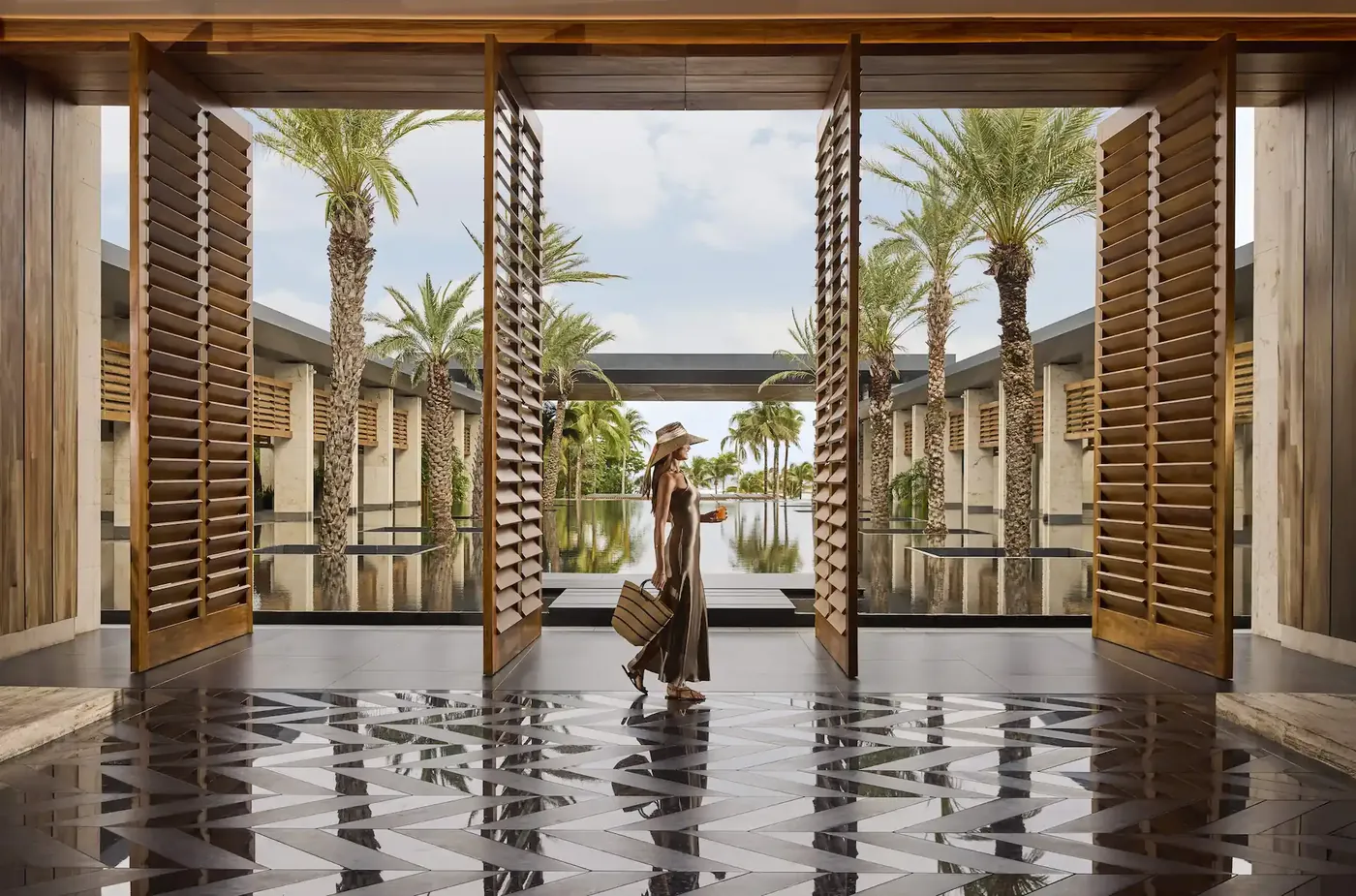 Lobby columns framing the Caribbean at Conrad Tulum